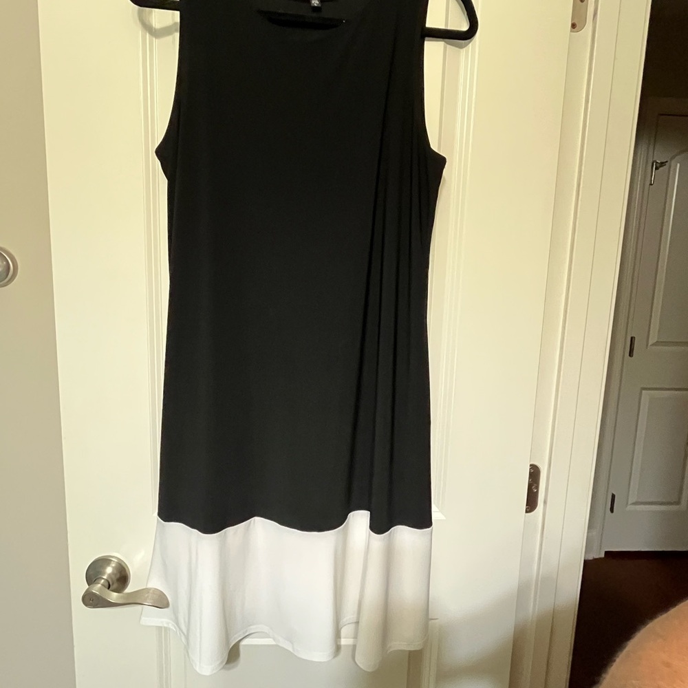 Nik and Nash Black Top Dress With White Bottom Trim..